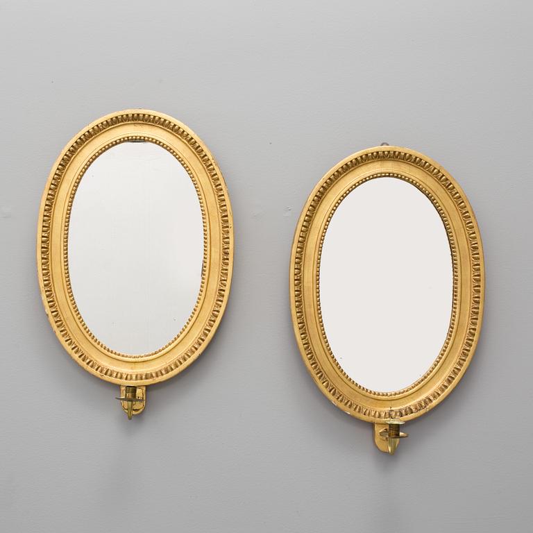 A pair of  one-light girandole mirrors, late 19th century.