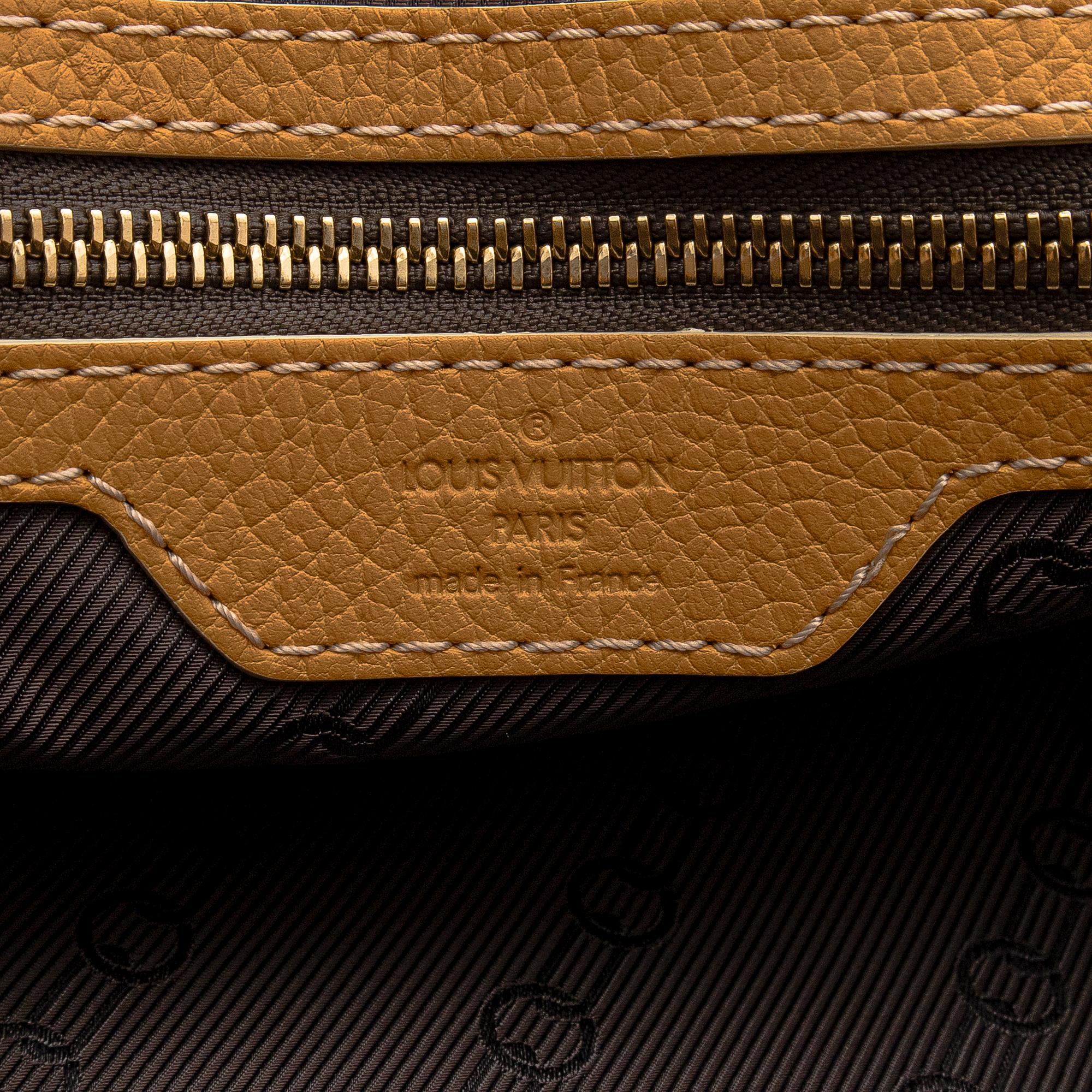 Louis Vuitton, a 'Tobago Carryall' bag.