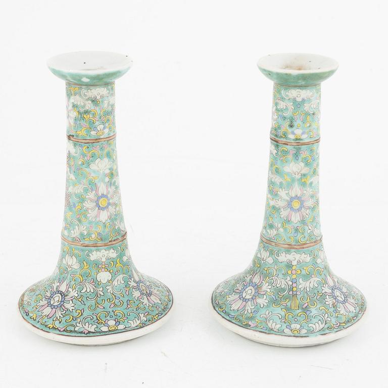 A pair of Chinese porcelain candle sticks, Qing dynasty, 19th century.