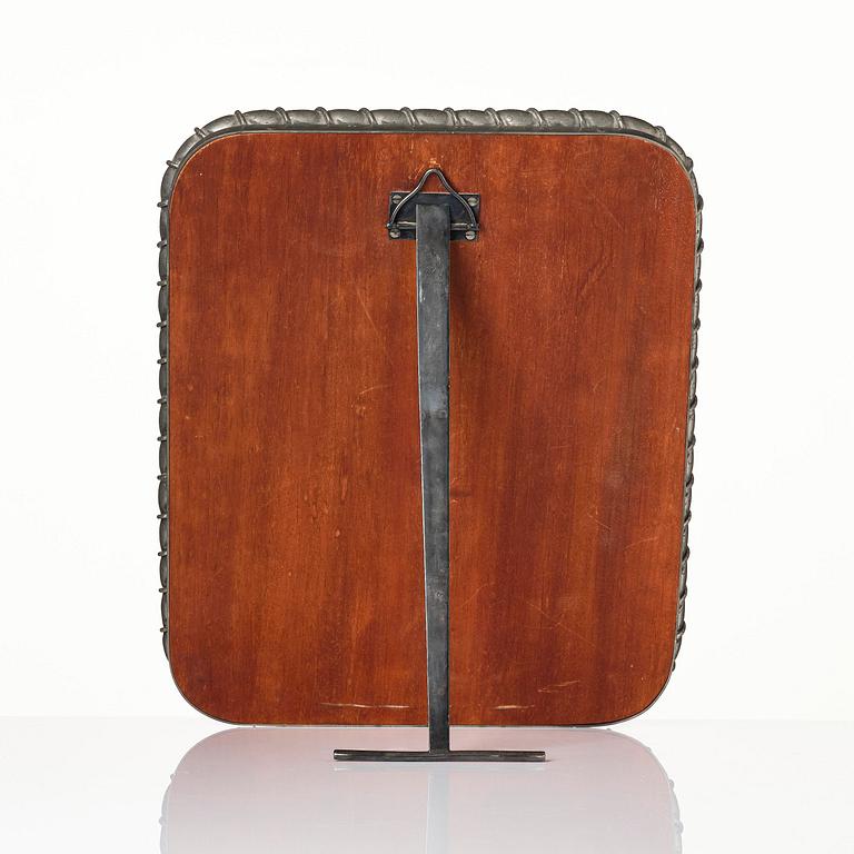Estrid Ericson, a pewter framed mirror model "A 2518", Firma Svenskt Tenn, Stockholm, 1947.