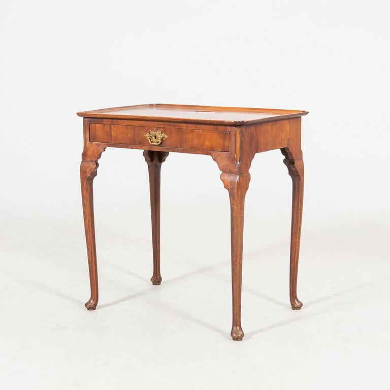 A late 18th century Queen Anne mahogany table.