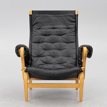 Bruno Mathsson, a 'Pernilla' armchair, Dux, Sweden, later part of the 20th century.