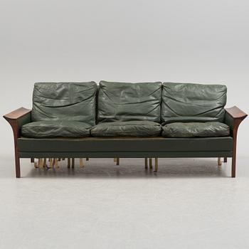 A 1960's Danish sofa, with 2 easy chairs and 2 tables by Glostrup.