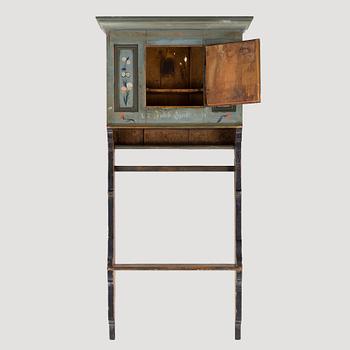 A 1700s hanging cabinet.