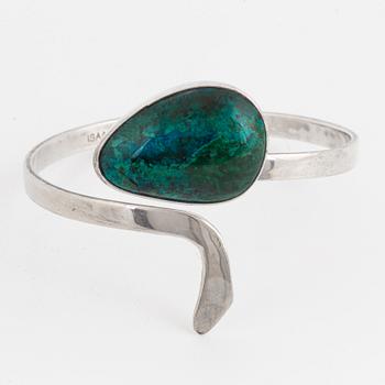 Isaac Cohen silver bangle with green stone.