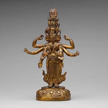 A Tibeto-Chinese gilt bronze figure of eleven-headed Avalokiteshvara, 19th Century.