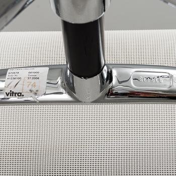 A pair of 'EA 108' desk chairs by Charles & Ray Eames for Vitra.