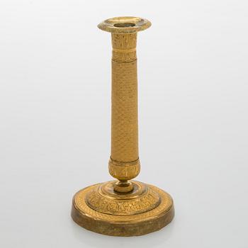 An early 19th century French Empire candlestick.