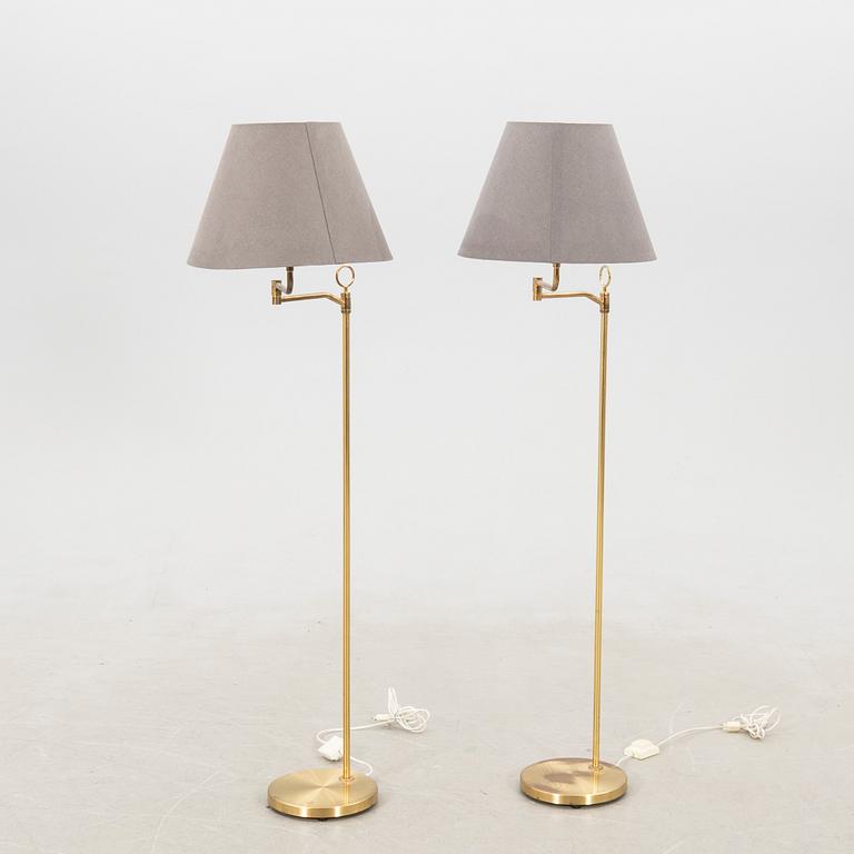 Floor lamps a pair Fixture craftsmanship late 20th century.