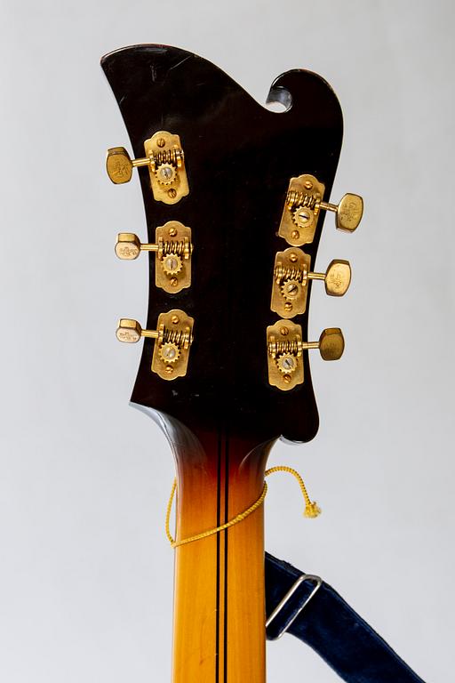 A Crafton Rex acoustic guitar.