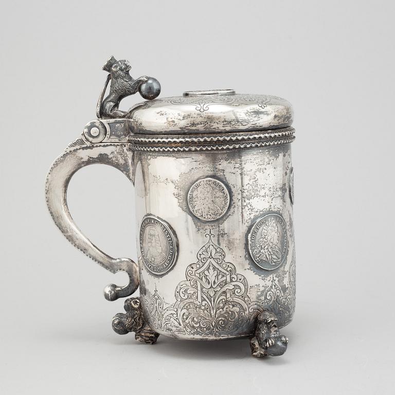 A parcel-gilt silver baroque style tankard.