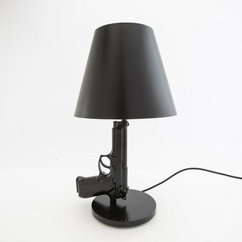 Philippe Starck, table lamp, "Gun bedside Lamp", Flos, Italy.