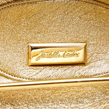 Judith Leiber, a clutch and pill box.