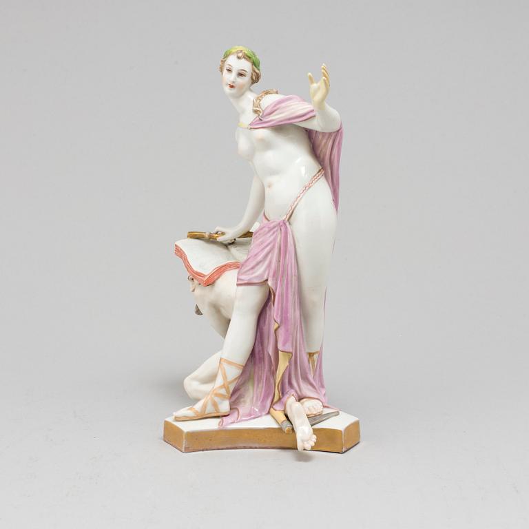 A German porcelain figure, 19th Century. Marked R.