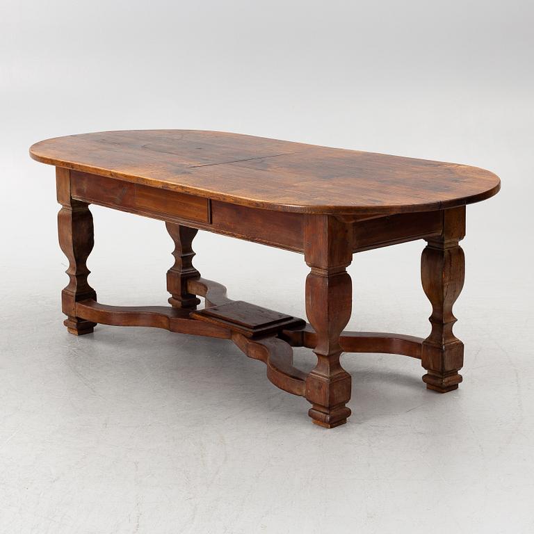 An oak dining table, Baroque early 18th century and Baroque style 19th/20th century.