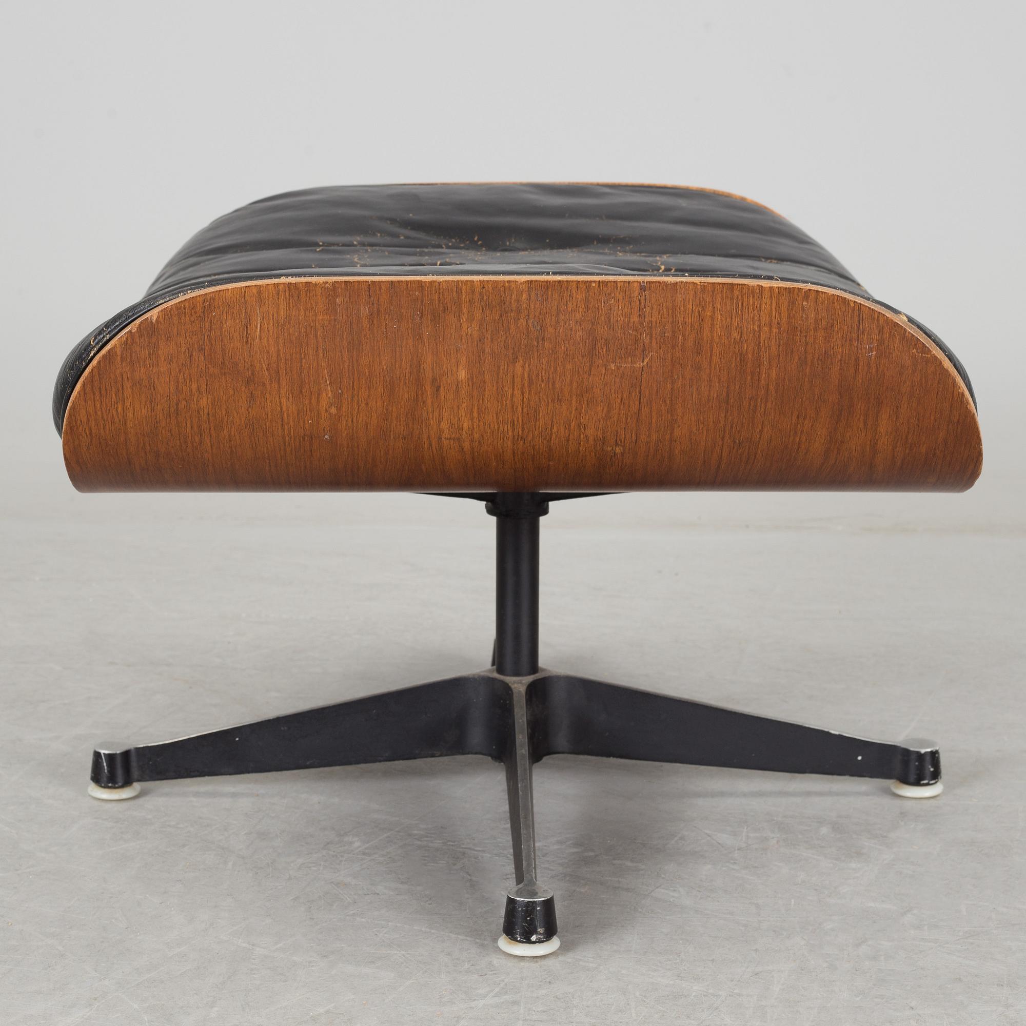 An easy chair and ottoman by Charles & Ray Eames, Herman Miller, USA, produced with licence by Hille, London.