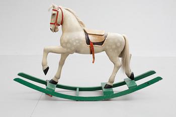 GUNGHÄST, trä och tagel. 1900-tal.