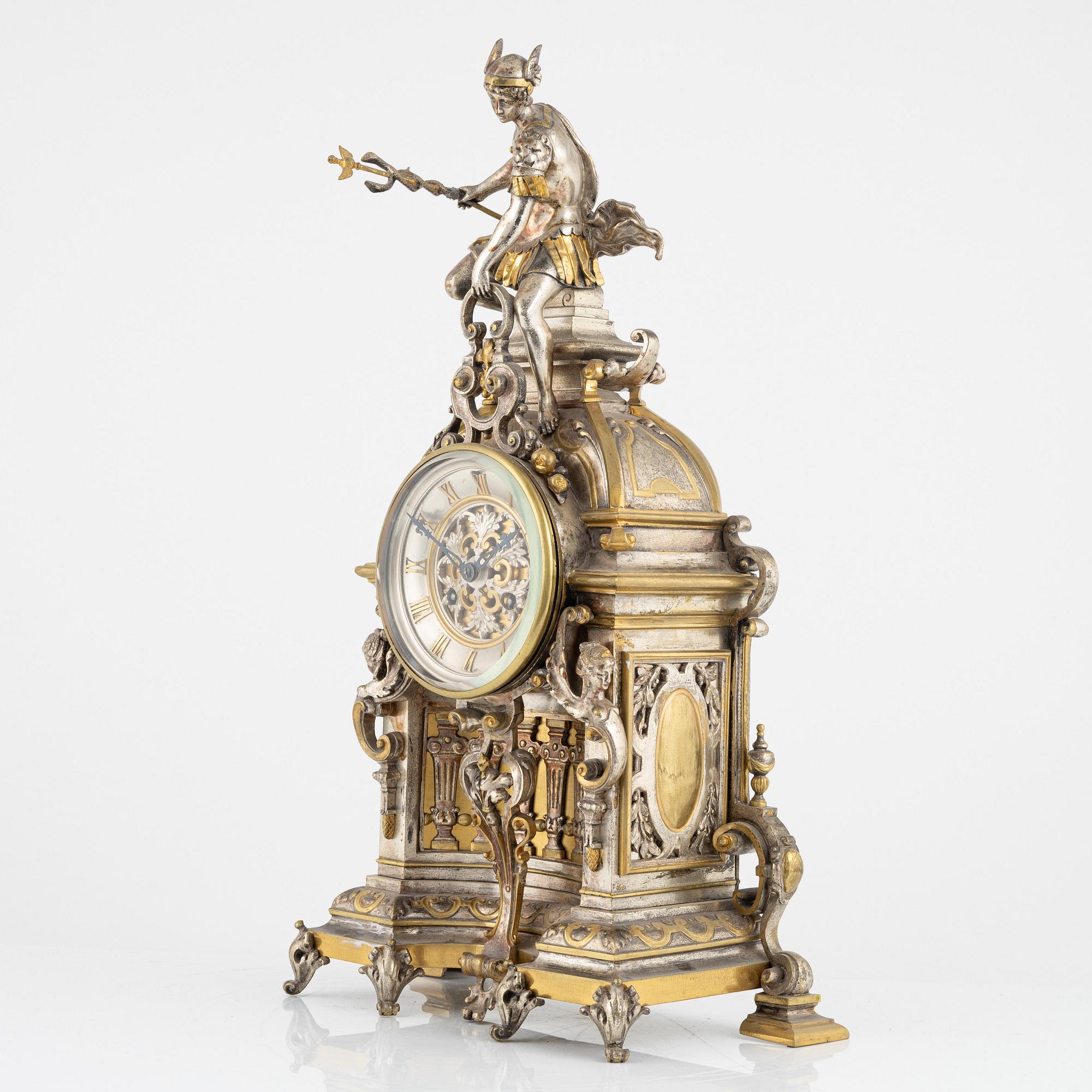 A Baroque style mantle clock, around 1900.