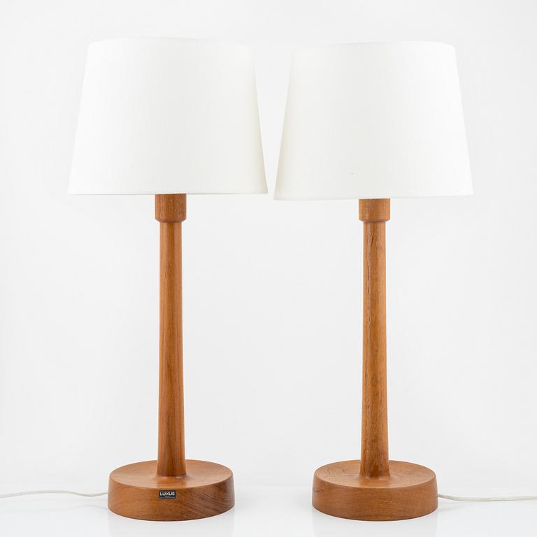 Uno & Östen Kristiansson, a pair of teak table lights, Luxus, Vittsjö, 1950s/60s.