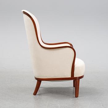 An 'Advokaten' lounge chair by Carl Malmsten, second half of the 20th Century.