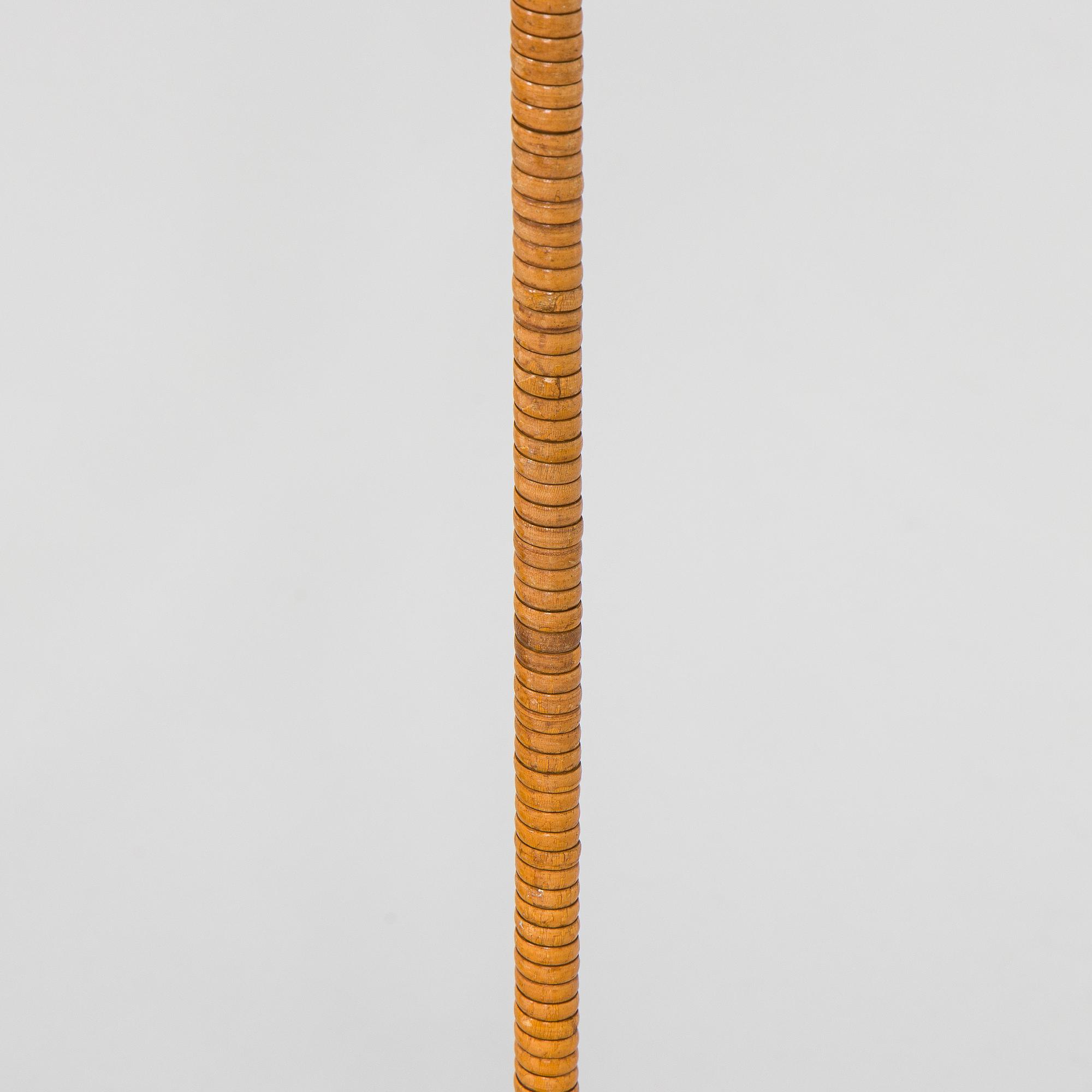 Paavo Tynell, a pair of mid-20th century K10-10 floor lamps for Taito Finland.