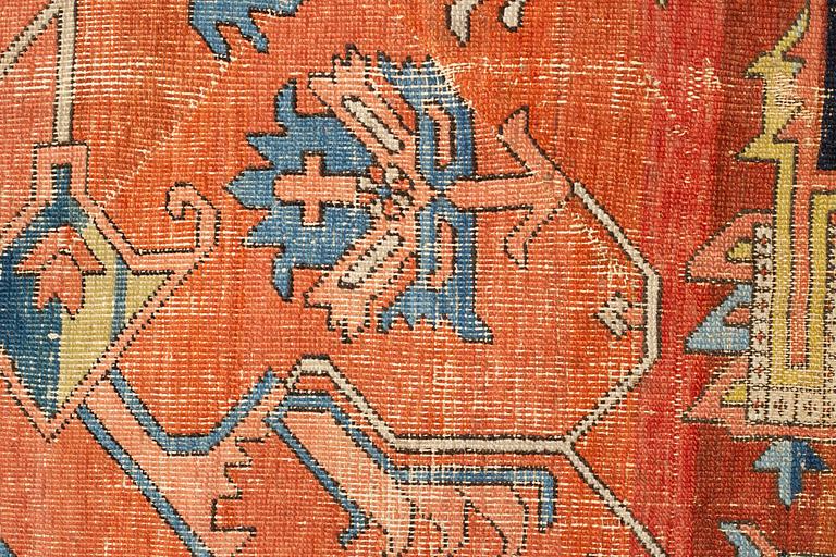 A carpet, an antique Heriz, ca 469,5-471 x 300-309,5 cm.