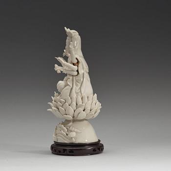 An eigth armed blanc de chine figure of a Bodhisattva, Qing dynasty, 19th Century.