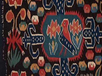 An 18th century carriage cushion, "Den innelykta fågeln", tapestry weave,  ca 52 x 67 cm, Scania (Sweden).