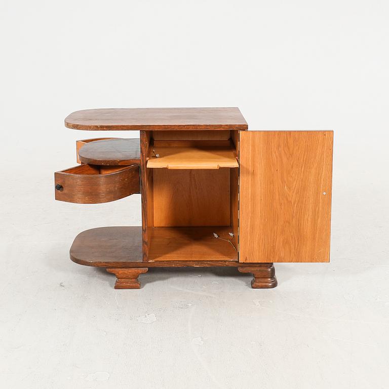 An Art Deco oak side table first half of the 20th century.