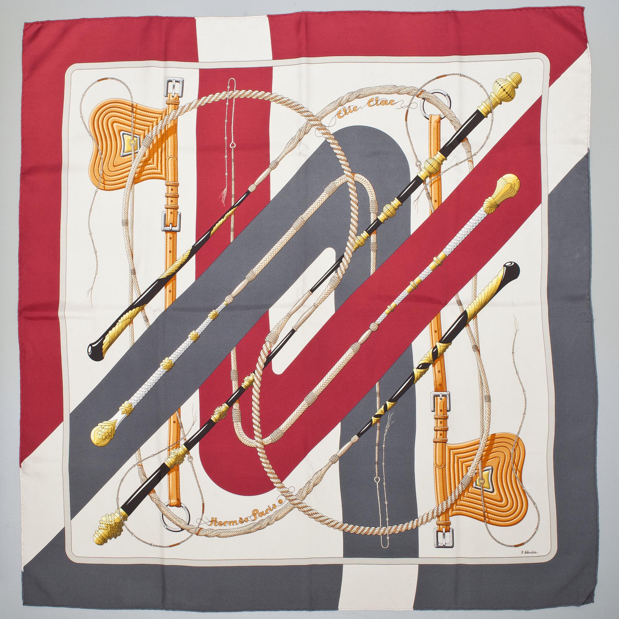 A Hermès silk scarf, "Clic Clouc".