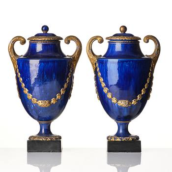 A pair of Swedish cream ware 'pistol handle' jars with covers, 1790's.