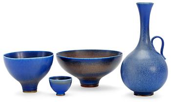 481. A Berndt Friberg stoneware vase and three bowls, Gustavsberg studio 1940's-50's.