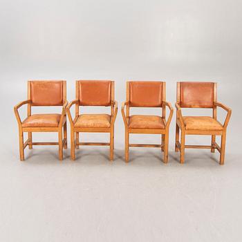 A set of four 1970:s Tage Poulsen Daumiller oak and leather armchairs for GM Möbler Denmark.