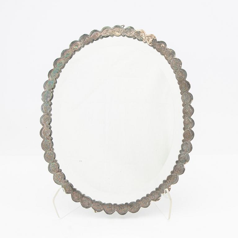 Mirror, unmarked silver, Oriental, first half of the 20th century.