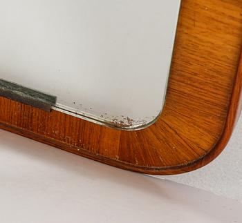 A teak mirror, mid 20th century.