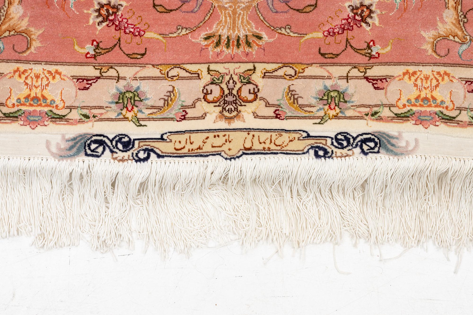 Rug, Tabriz, approx. 305 x 203 cm.