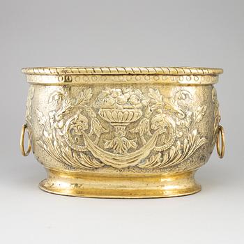 An 18th century brass champagne cooler.