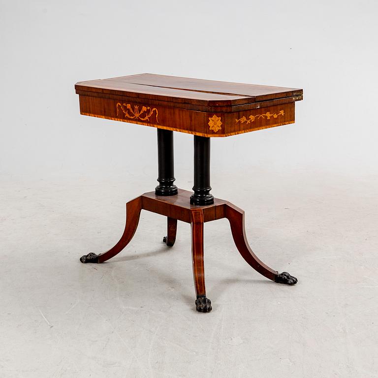 A mid 1800 late Empire game table.