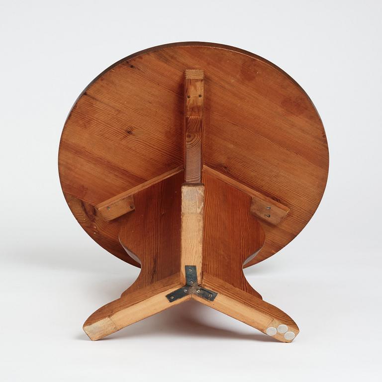 Nordiska Kompaniet, a stained pine circular top 'Lovö' table, ca 1941.