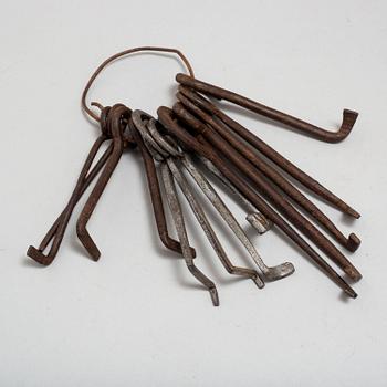 A set of 13 iron picklocks, 18th century.