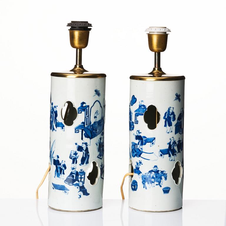 A pair of blue and white vases made in to lamps, late Qing dynasty, 19th Century.