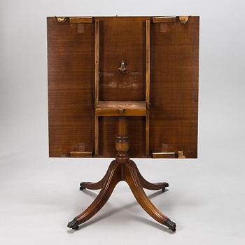 A 20th century English style dining table.