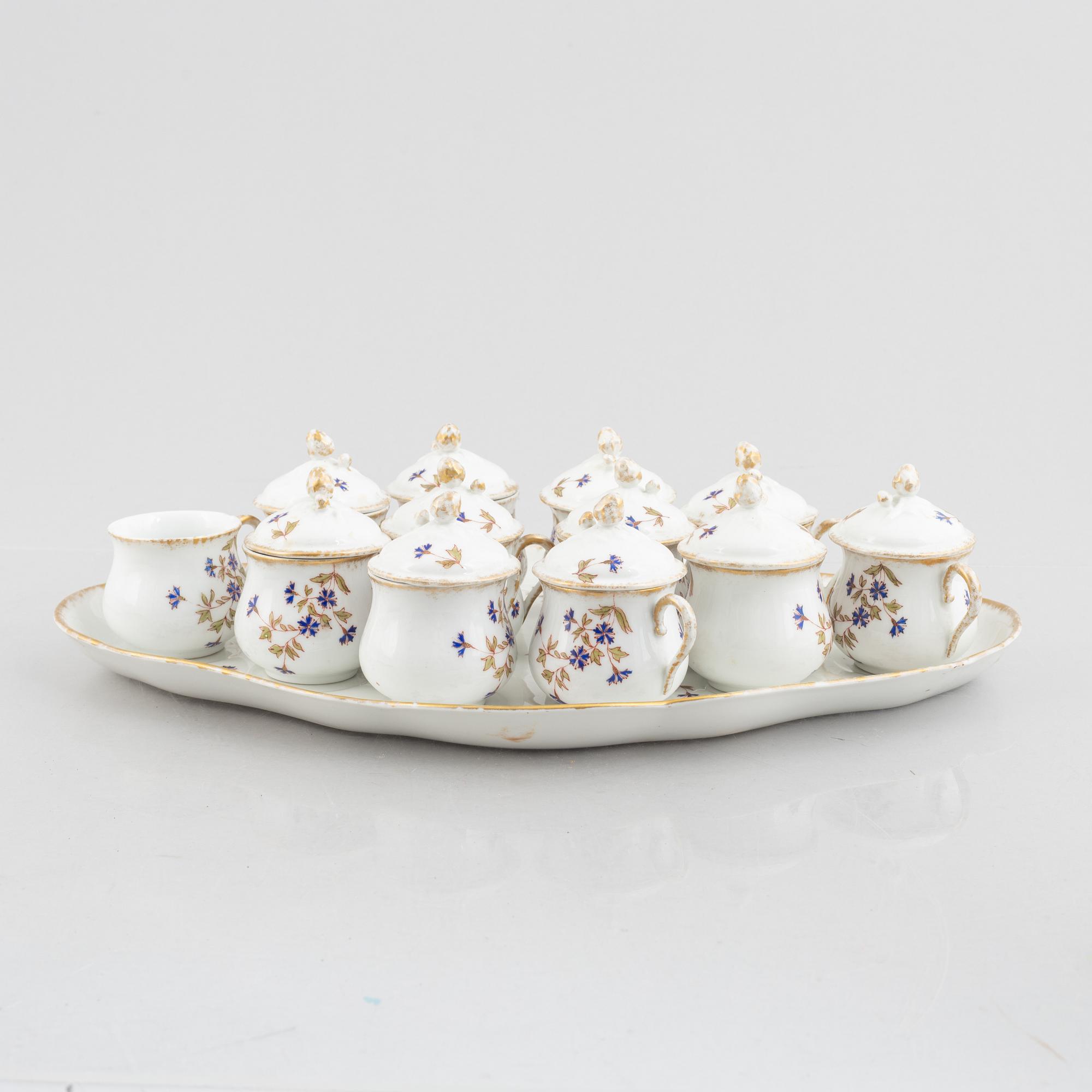 Tray with twelve creamers, porcelain, Limoges WG & Co, France.