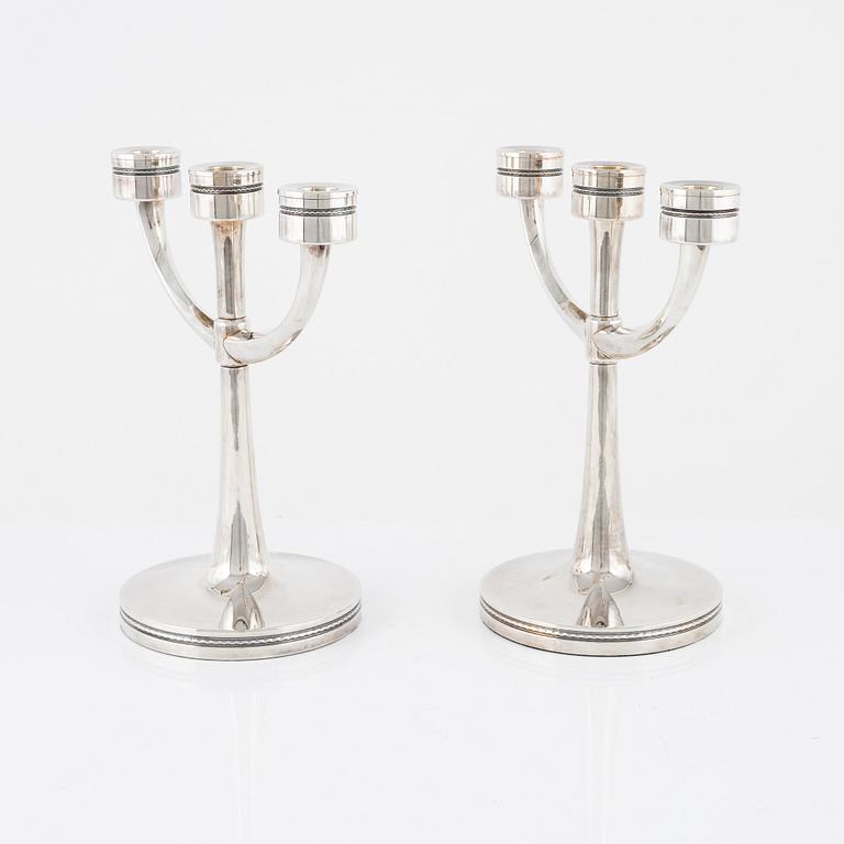 Eric Löfman, kandelabrar, ett par silver, MGAB, Uppsala, 1978-79.