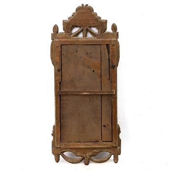 A Gustavian giltwood mirror, Stockholm, late 18th century.