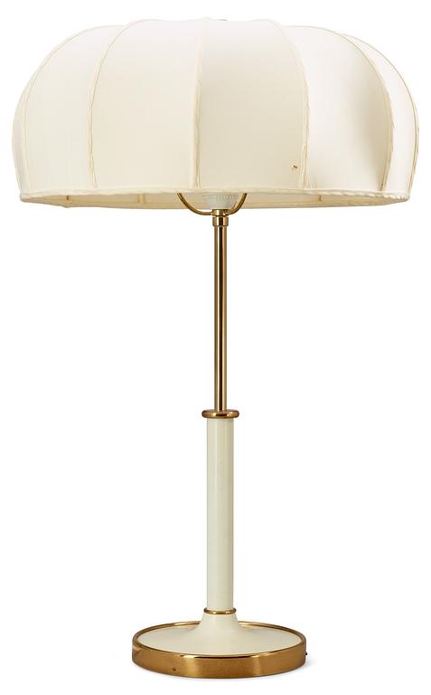 A Josef Frank brass and white lacquered table lamps by Svenskt Tenn, model 2466.