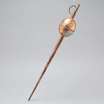 A 19th century pipette in copper.