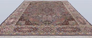 A Kirman lavash milifleur carpet, 400 x 310 cm.