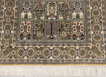 An Oriental silk rug, approx. 122 x 79 cm.
