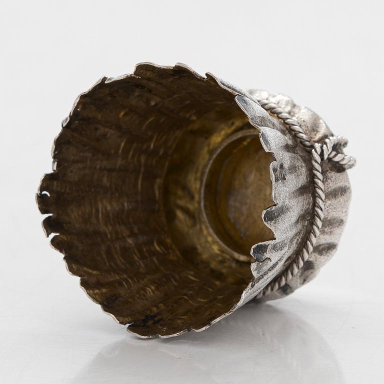 A silver and glass bottle with eight silver charka, maker marks of Pyotr Yermolajevich Davidov, Saint Petersburg, 1884.